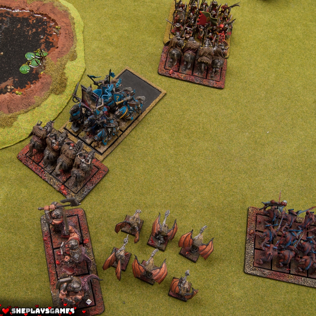 After defeating the Beast of Nurgle, the Knights of the Realm charged the Chaos Knights.
