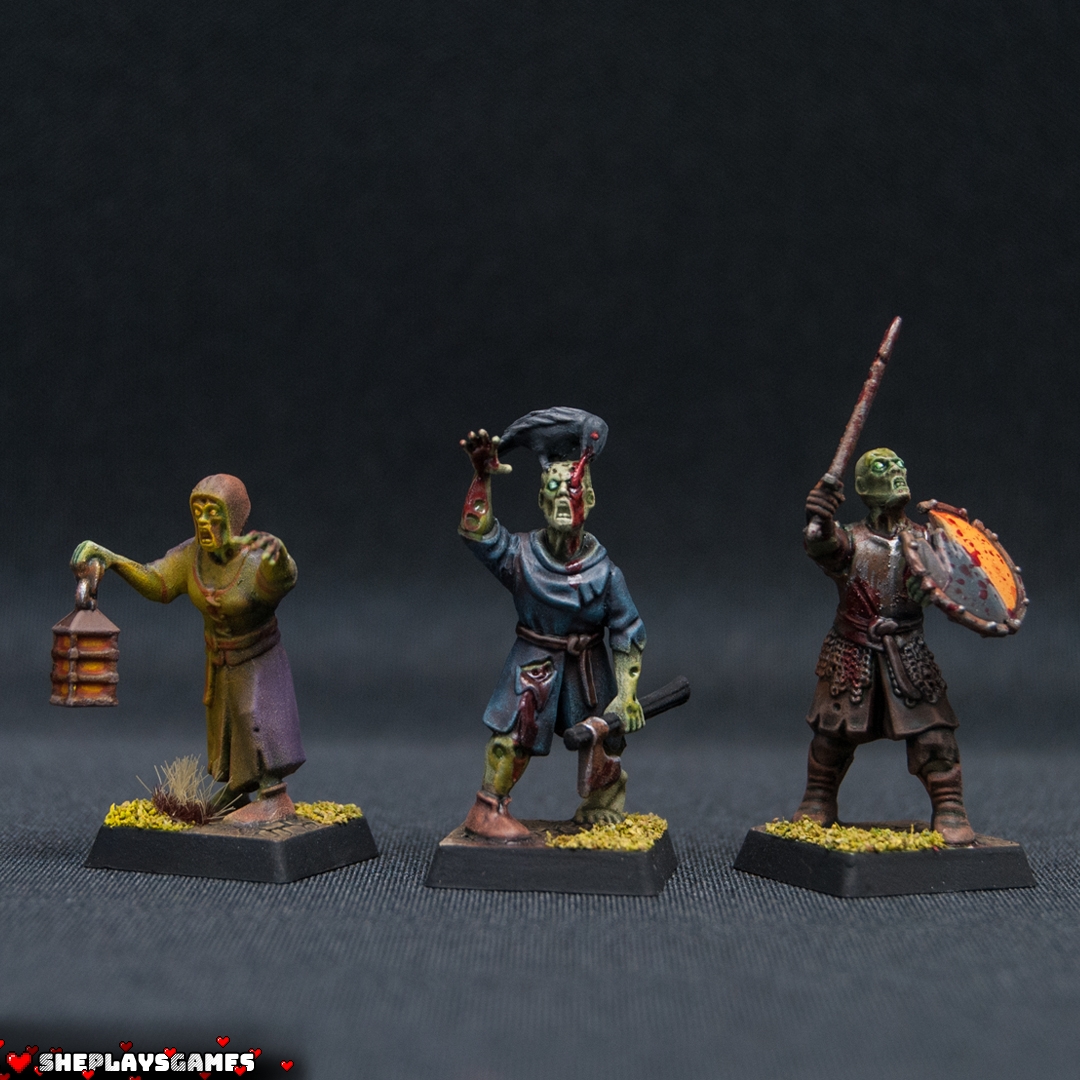 Undead peasants with a crow, a lantern and a zombie Mousillon warrior.