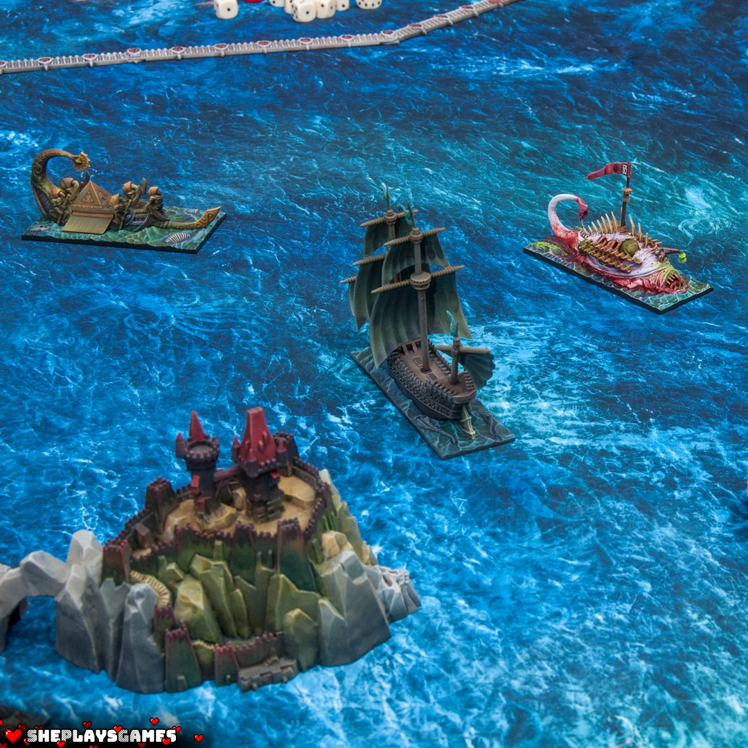 A pirate-ship Swordfysh from Sartosa is preparing to fight with enemy battleships: Curse of Zandri and Skabrus.